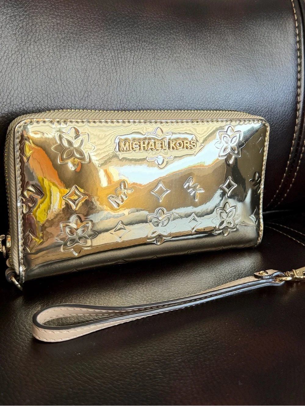 Michael Kors Gold Metallic Floral Embossed Wristlet Clutch New Without Tag.